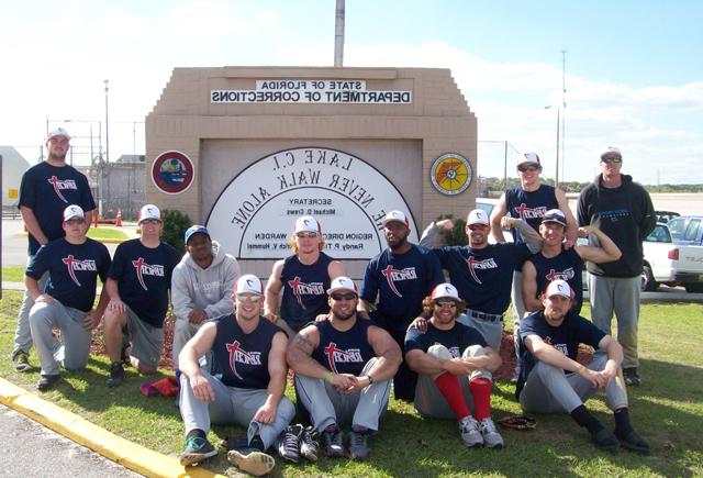 Campbellsville University football players pose in Florida where they did mission work.