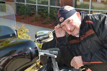 Dr. E. Bruce Heilman gets ready to leave from CU on his motorcycle April 23. (Campbellsville University Photo by Joan C. McKinney)