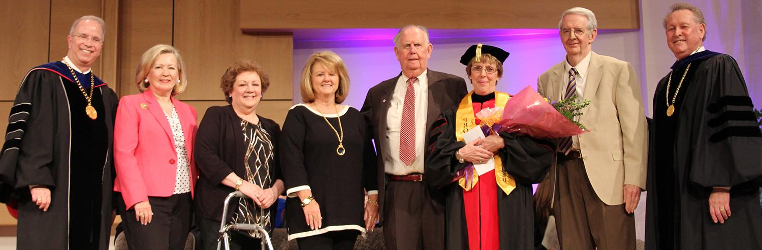 Dr. Frank Cheatham, senior vice president for academic affairs; Randy Herron; Mudd; Roy Rich; Betty Ford; Sara Curry; Gwinn Hahn; and Dr. Michael V. Carter, president