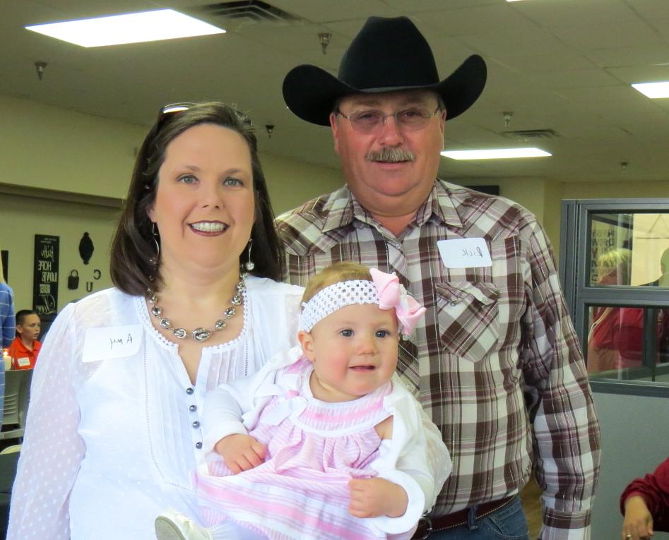 Amy and Rick Marcum, and their little girl, Adyson, 8 months old, were at Campbellsville University's Larry and Beverly Noe Somerset Center graduation celebration on April 25. Amy, who will be getting her social work degree, said Adyson will be glad her mom is getting out of school. (CU photo by Linda Waggener)