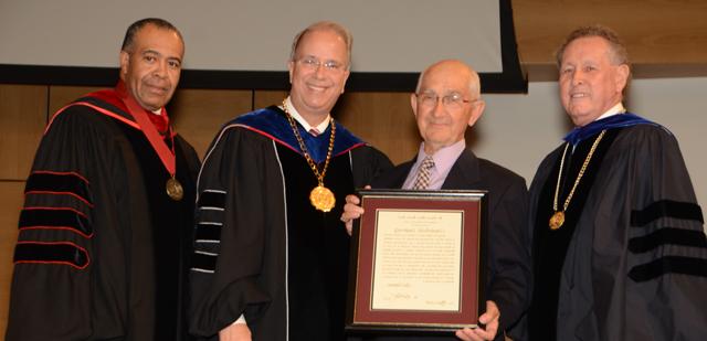  Paul Osborne, a member of the Campbellsville University Board of Trustees and former mayor of the City of Campbellsville, was presented the Algernon Sydney Sullivan Award from, from left: Dr. Frank Cheatham, senior vice president for academic affairs; Dr. Michael V. Carter, president; and Dr. Joseph Owens, chair of the CU Board of Trustees. (Campbellsville University Photo by Rachel DeCoursey)  